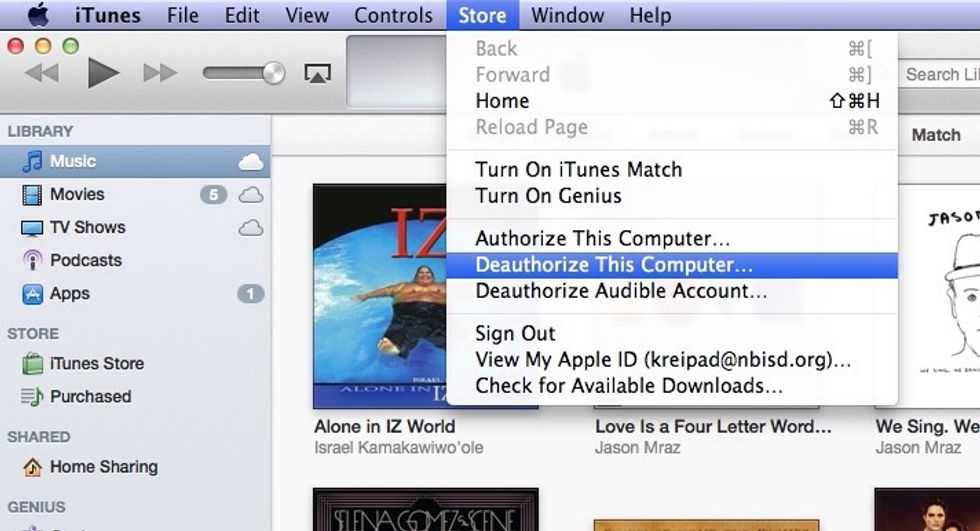 2.  From the Store menu, choose "Deauthorize This Computer."
