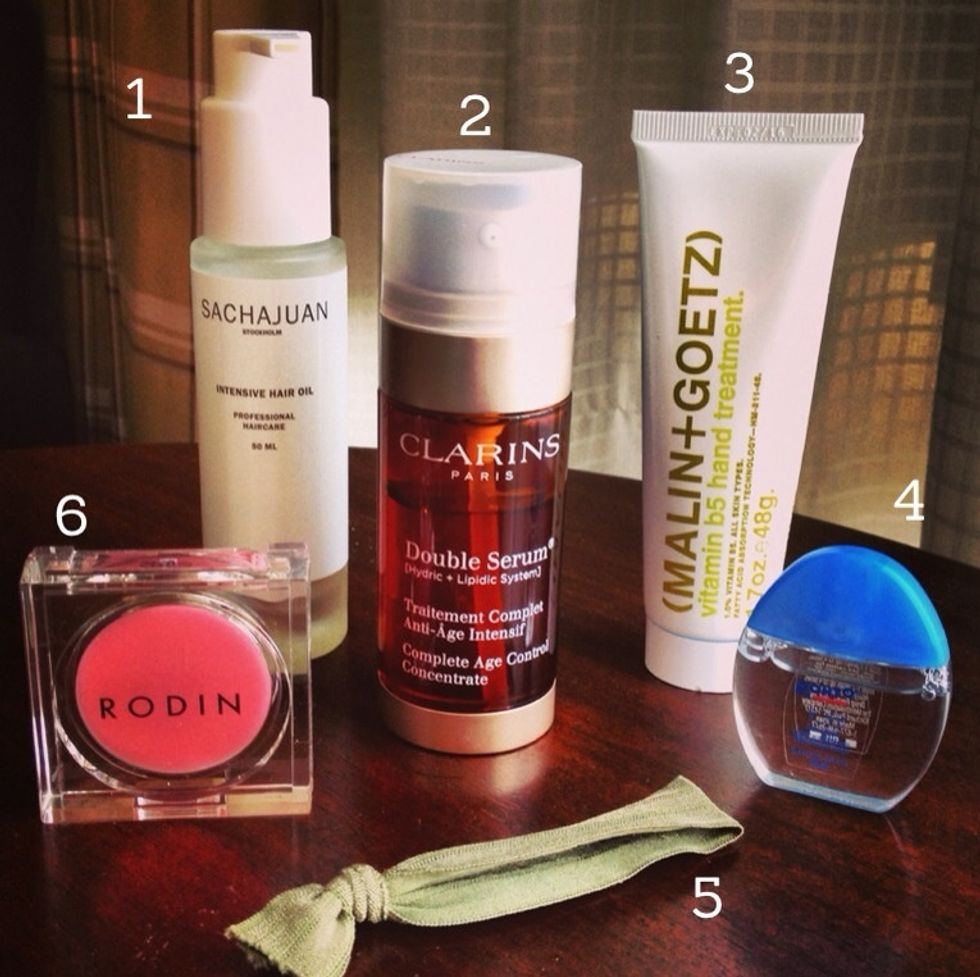 2. Get ready in an everyday fashion, then immediately put all needed toiletries into your suitcase.