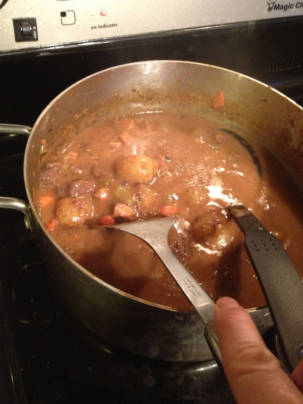 2 hours later... Scrape all the bits off the bottom. It's not gross, stir well. Watch how the colour turns a darker brown. That means its going to be tasty.