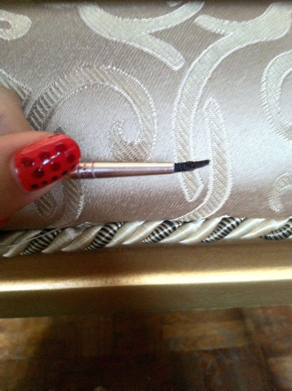 2: I use this small pointed brush to make the dots. Just dip the tip of the brush in the nail polish and tap the tip to the nails to make the dot. This brush is good to make dots and stripes.