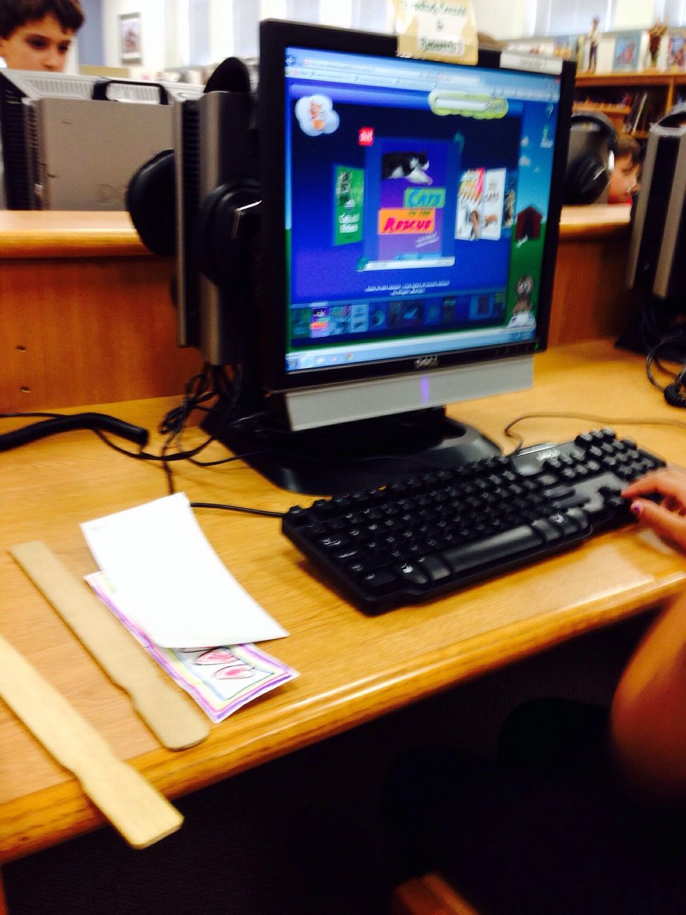 2. Next, you go to the computer or you look for a book on the shelves.