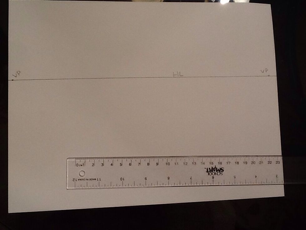 2 point perspective; start with you horizon line and place two vanishing points as far apart as possible.