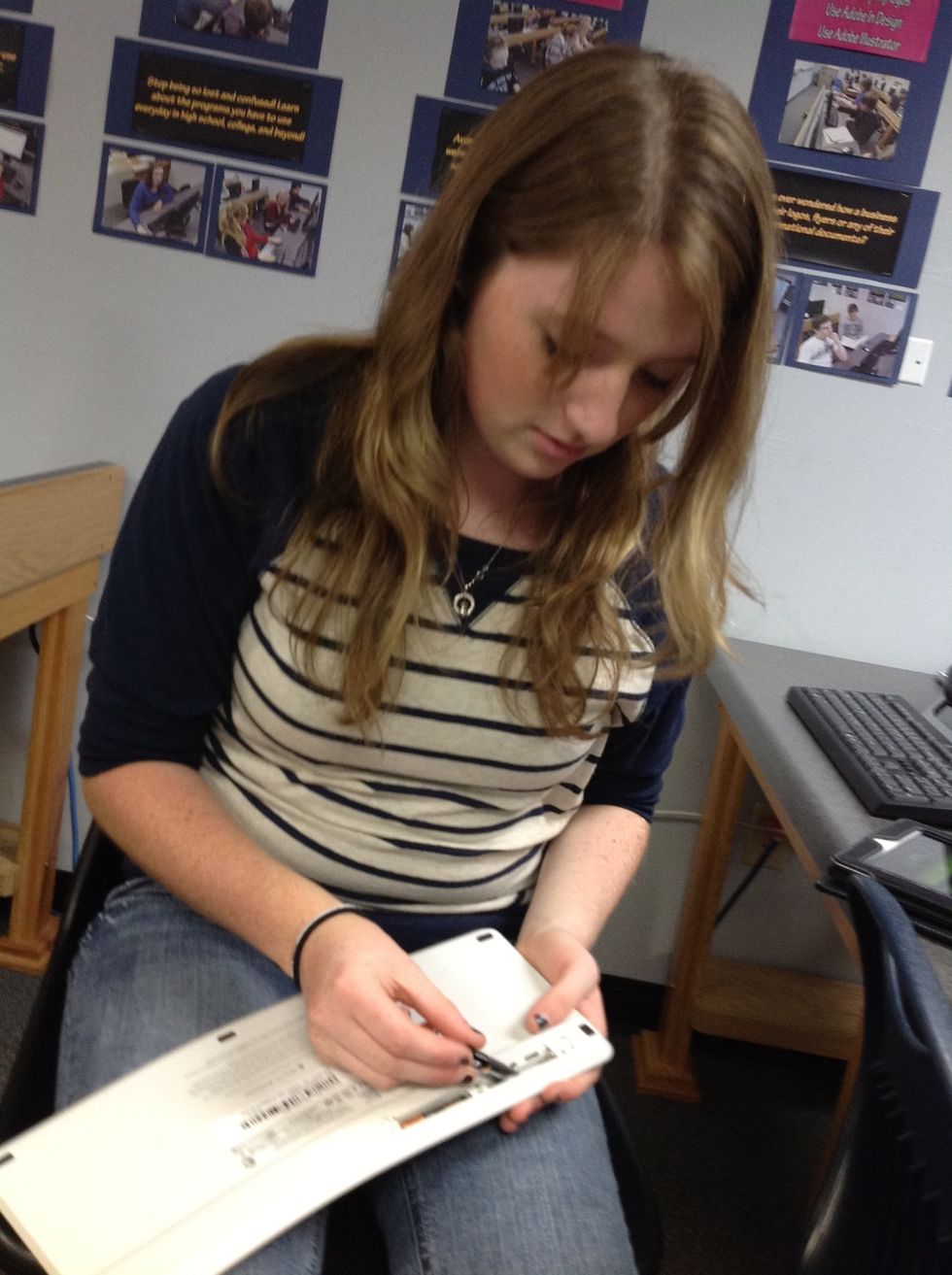 2. Put batteries into keyboard.