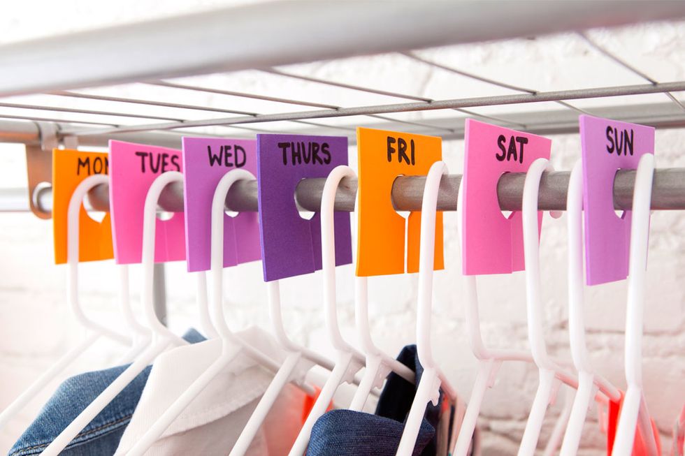 2. Separate Outfits for the Week with Foam Markers: If structure is the name of your family\u2019s game, make weekly outfit planning simple with these DIY day of the week markers.