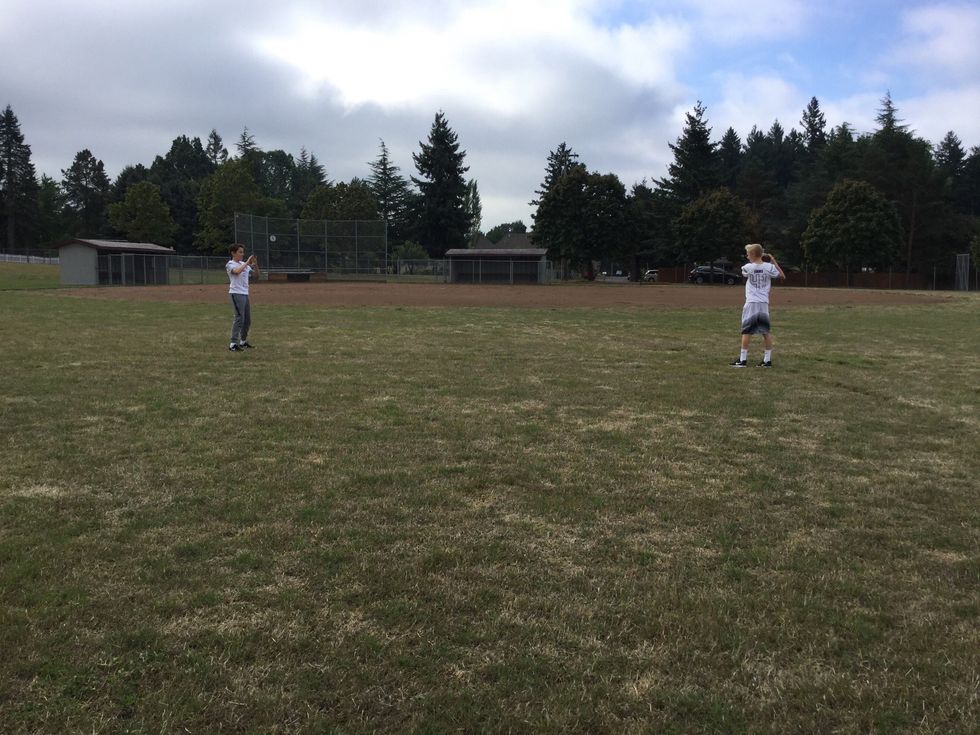 2. Stand facing each other so you can see their face.