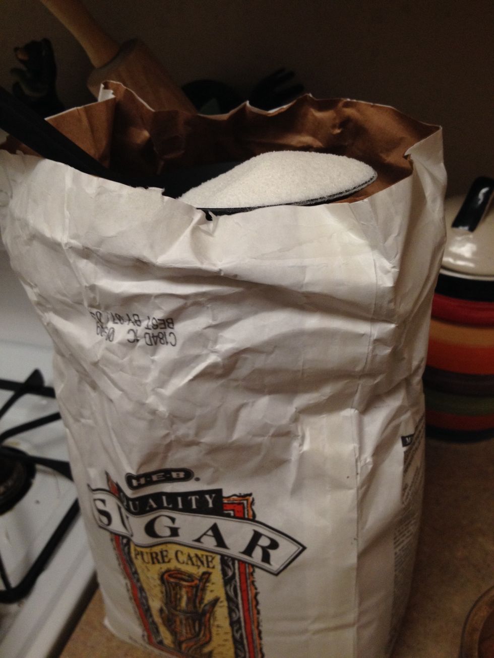 2 very large spoonfuls of sugar and began to whisk the cocoa...