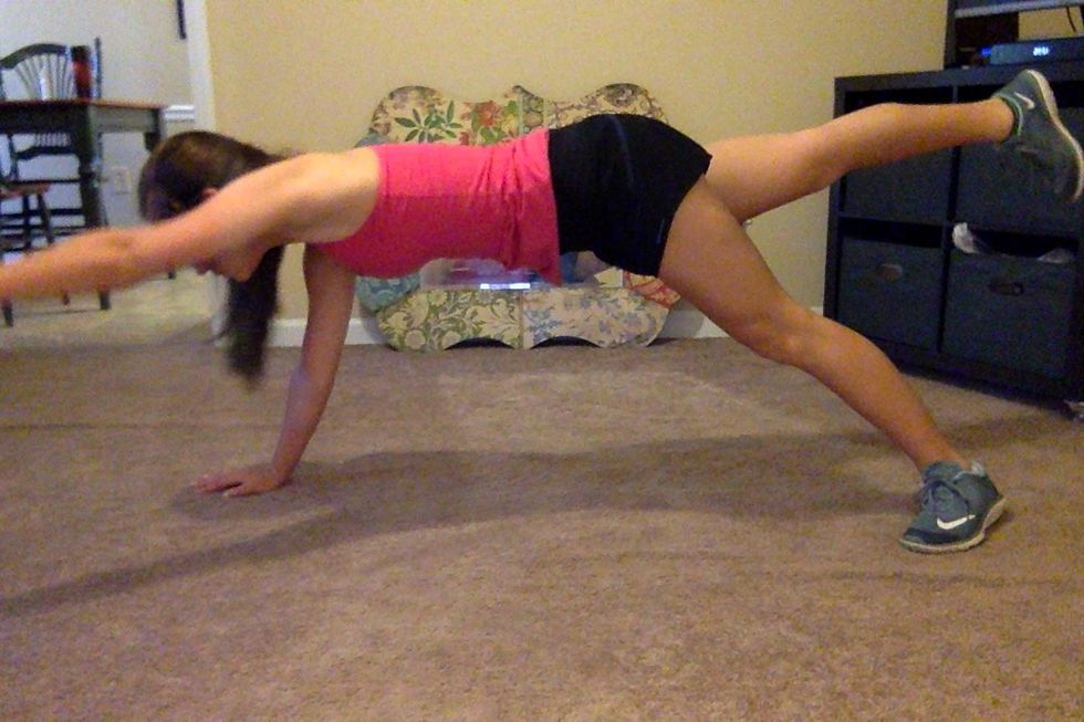 25 Alternating Superman Planks: Start in a plank position. Simultaneously lift your right hand and left leg, extending both straight out