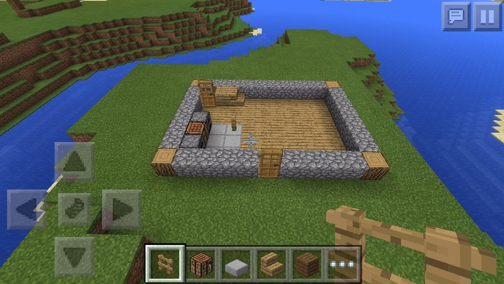 2nd layer , the door at the back is NOT on the corner block you stand on the corner block to place it