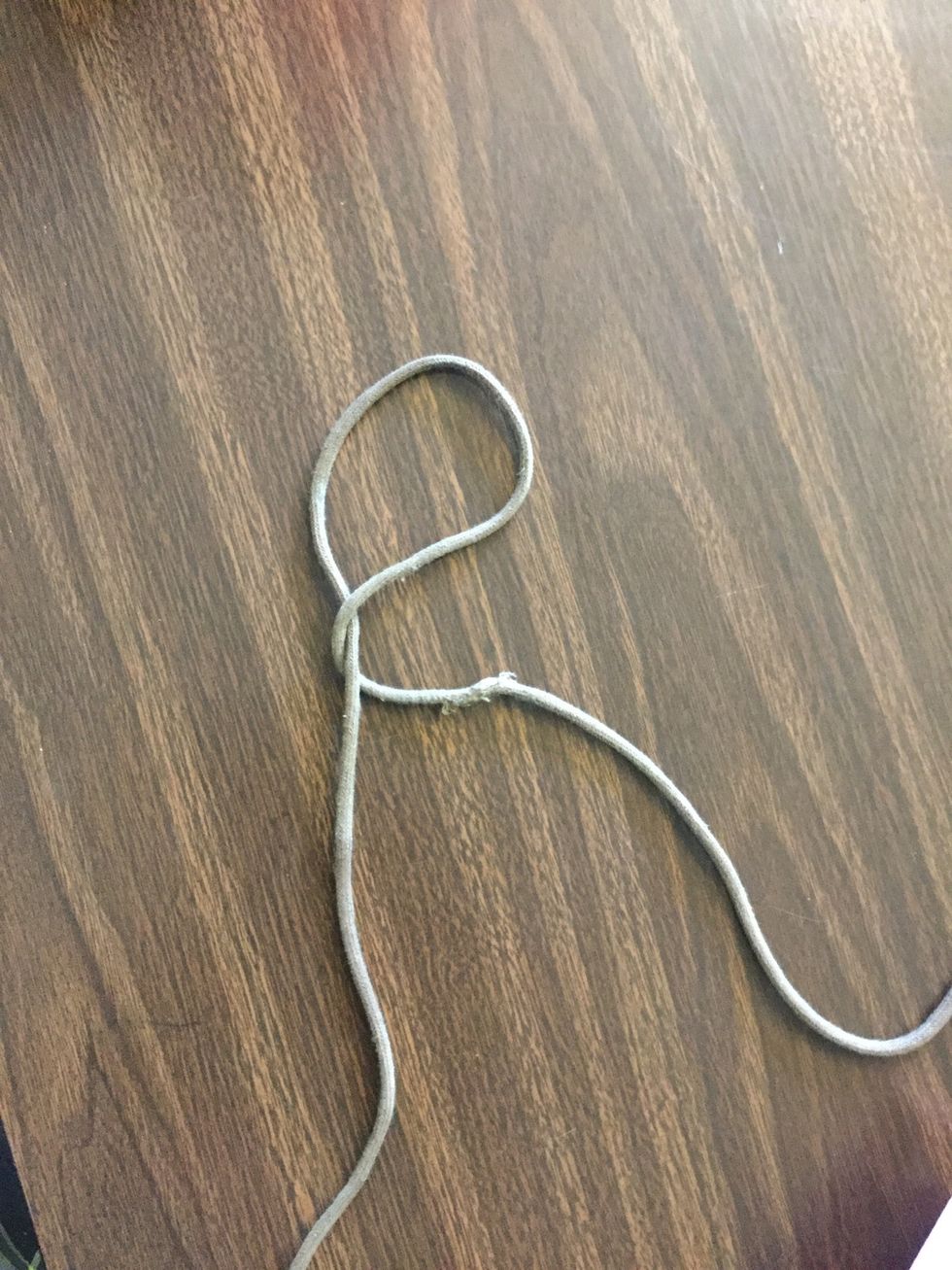 2nd pull the left side of the rope to the right