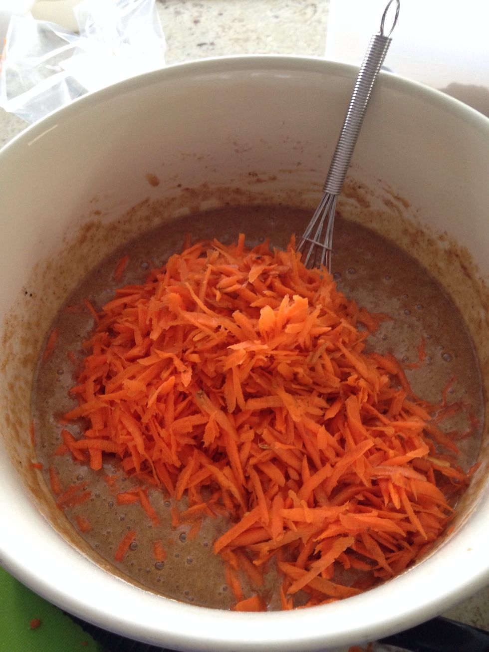 3 cups of grated carrots and pour them in.