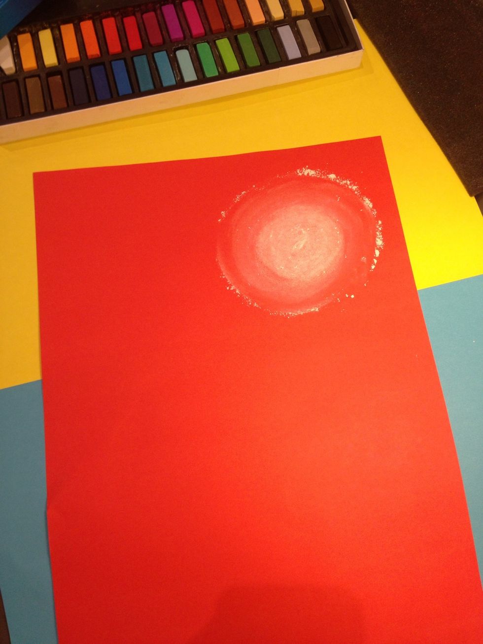3. I will start to distribute the color using my finger in a circular motion around the circle to look like the moon or the sun !
