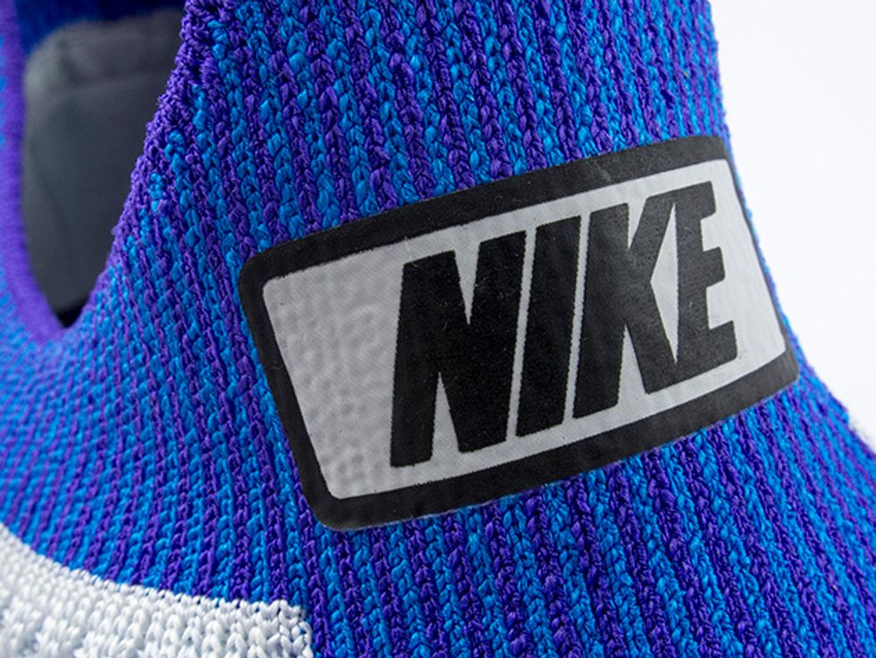 3. Mariah Flyknit Racers will have a logo patch fused onto the tongue. Check that the typeface used is correct, the K and E of Nike are joined.