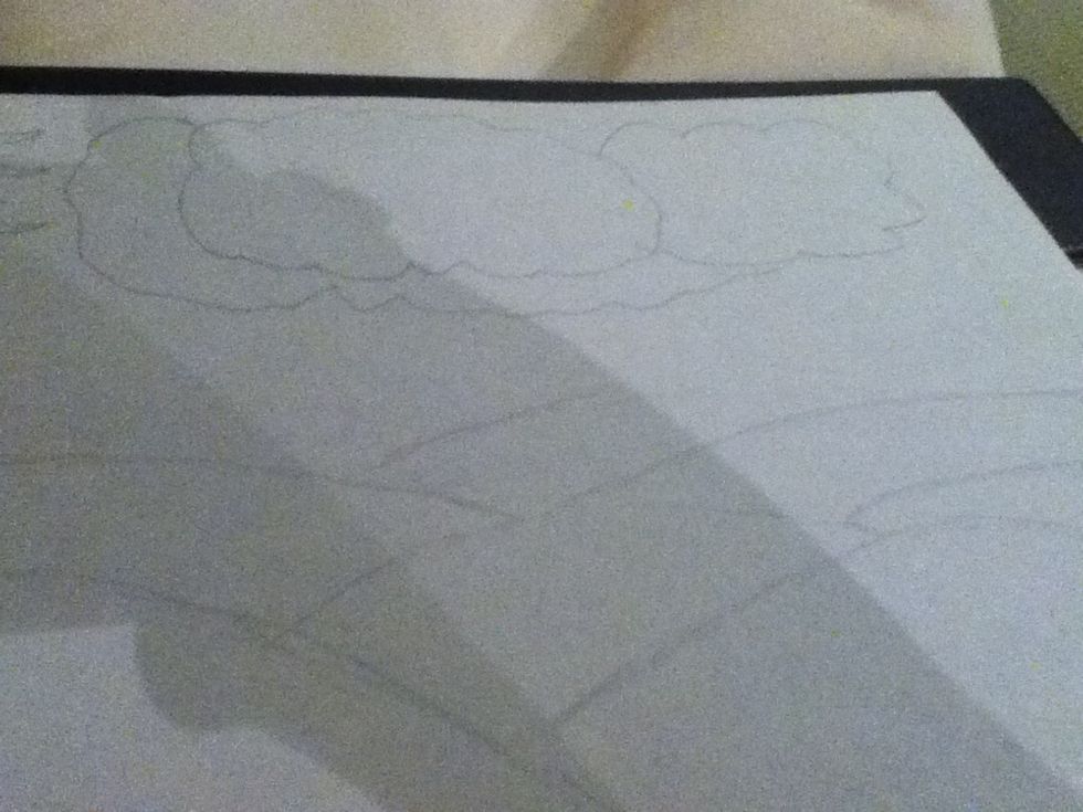 3.) Now, add some clouds in the top middle-to the top right corner of the picture\u2601\u2601\u2601