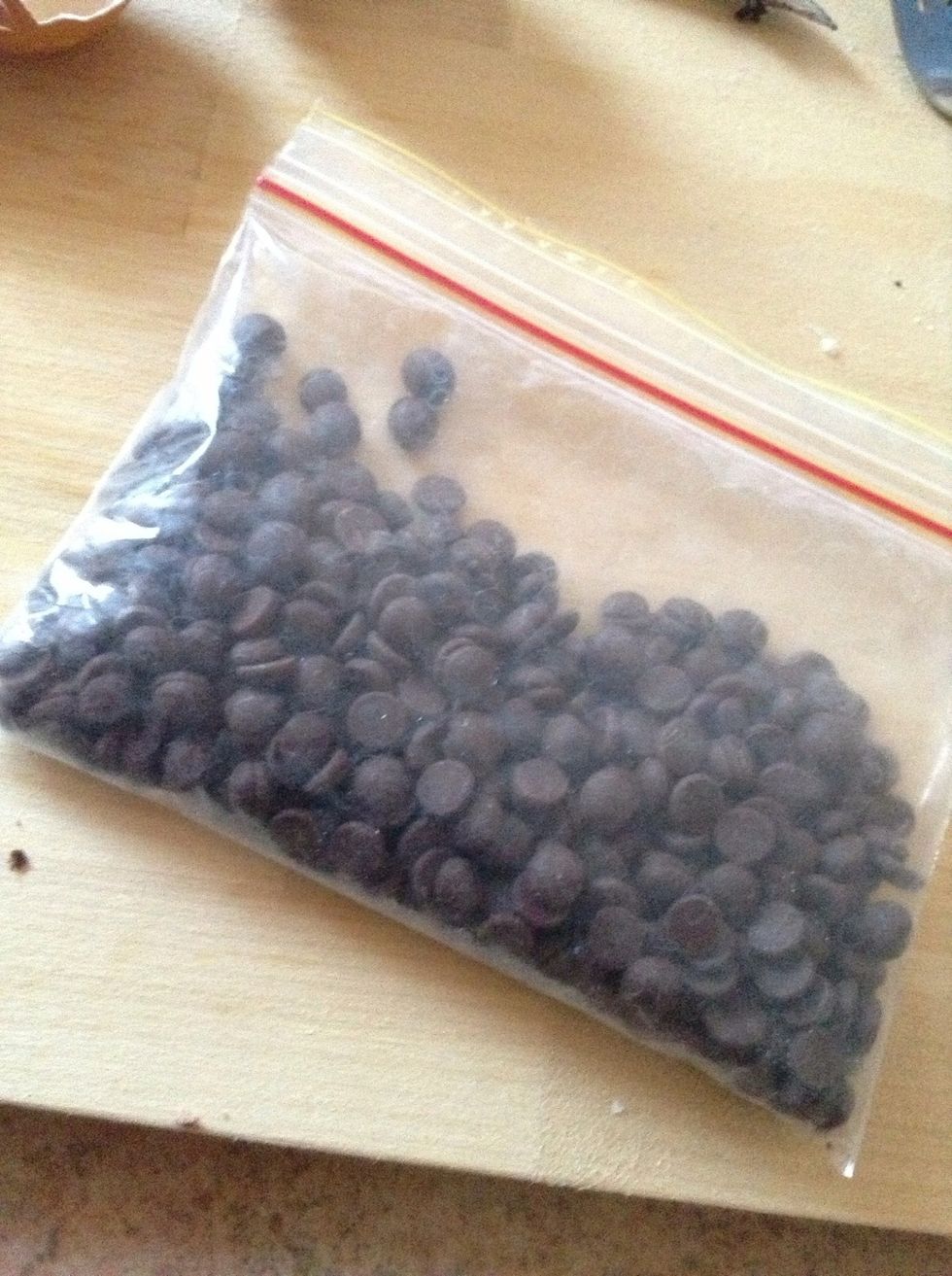 3.) Put the ingredients in a large bowl, and add in 1/2 cup of choc chips (whatever flavour, but I used dark chocolate)