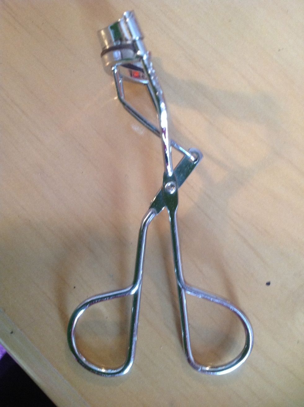 3) then curl your eye lashes