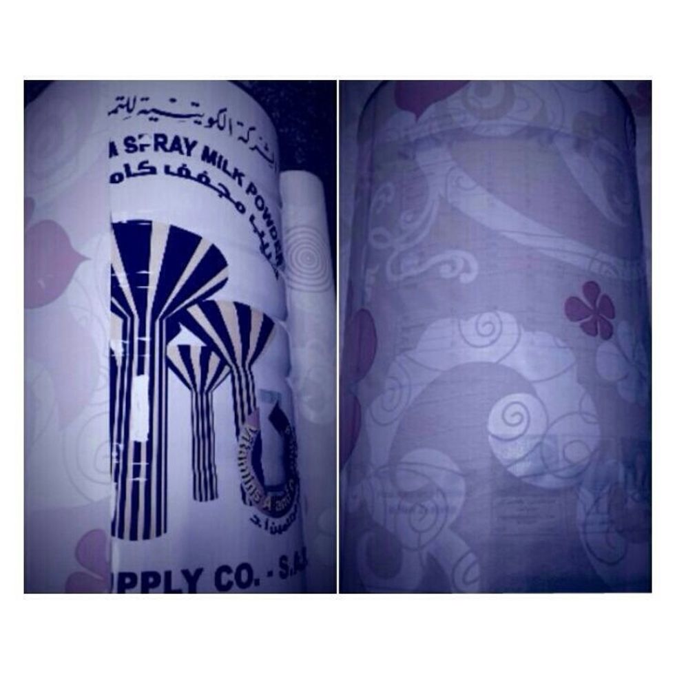 3- Then put the paper sticker on the lid of the milk in order to give a beautiful sight ...