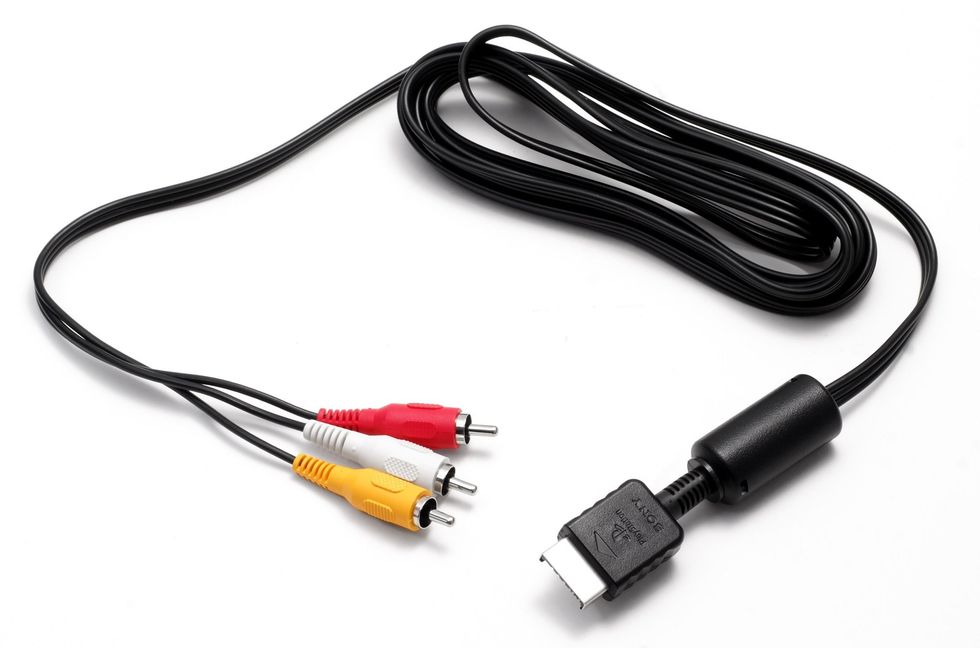 3) Wind up the excess middle part, and mask-tape it with the name of the cable (ex. Wireless router to Comcast box) and plug it back in