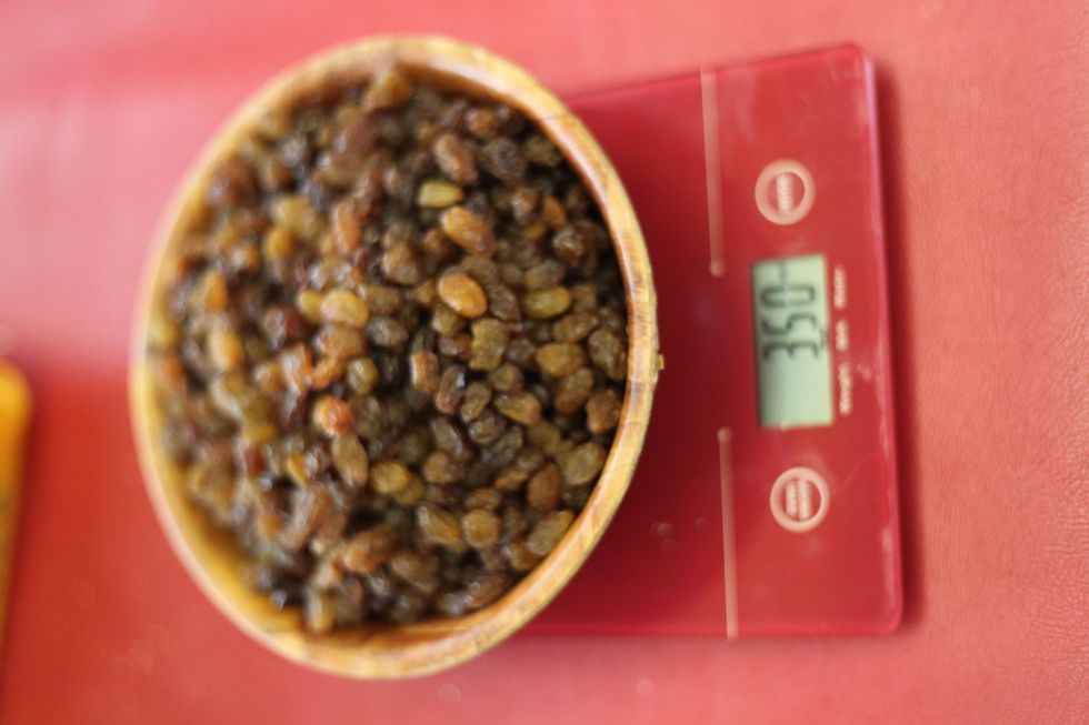 350 gms of sultanas (dried grapes). Put all of these ingredients aside in one big bowl and mix them all up.