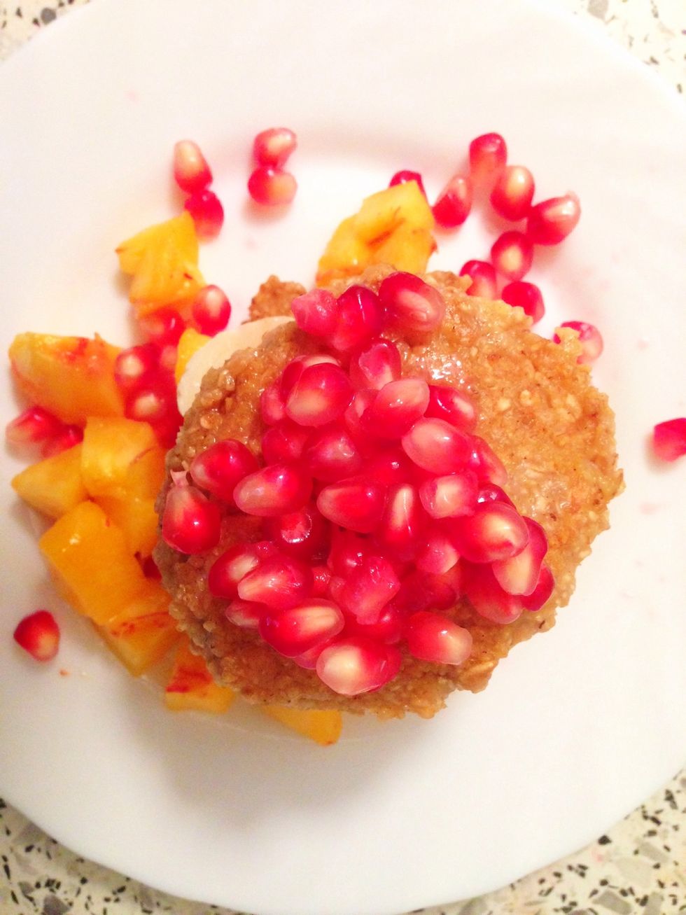 3rd pancake with pomegranate seeds on top.
