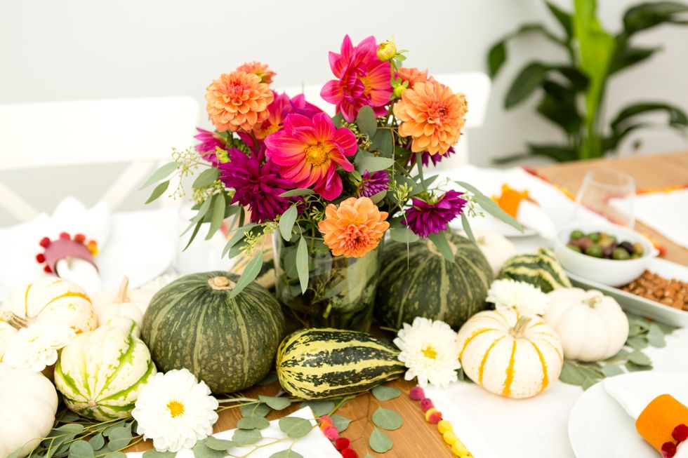 4. Create a bold and colorful statement centerpiece using the foliage of the season for a totally Instagram-worthy table.