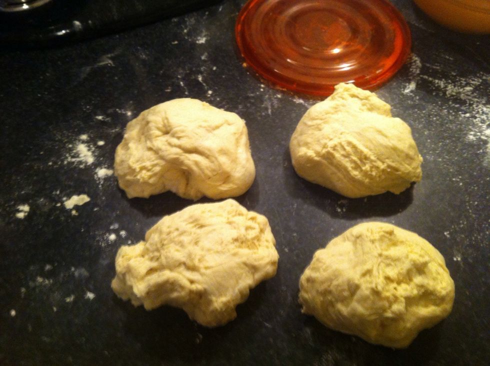 4 dough lumps that are roughly 282 grams each. Now we get to ball the dough.