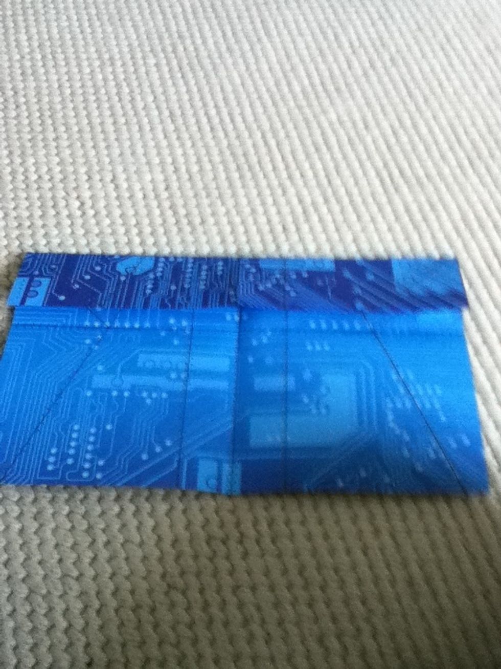 4: Fold down top half into the middle