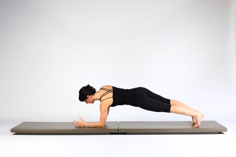 4. LOW PLANK TO HIGH PLANK-      Lower left elbow where left hand was