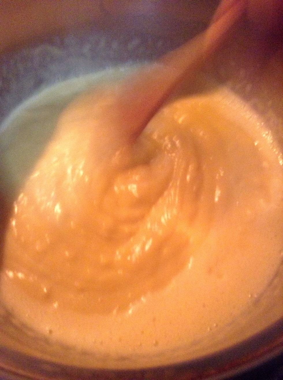 4. Take the mix into the pan on low heat. Stir with a spoon constantly to avoid burning or lumping.