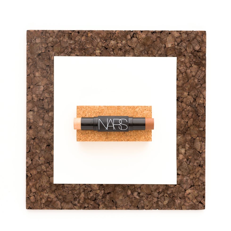 4. The NARS Sculpting Multiple Duo has the power of an entire makeover! One end has a cream bronzer for contouring and the other is packed with an illuminating highlighter for a luminous finish.