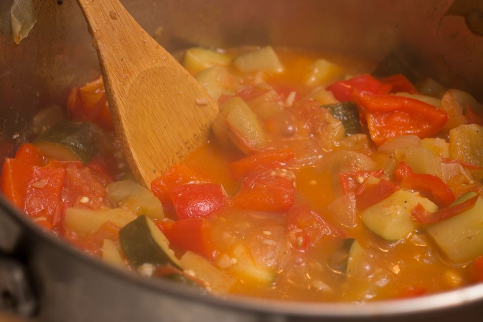40 minutes. Stir and remove the lid. Now that everything is stewed together we are going to want to reduce the liquid a bit.