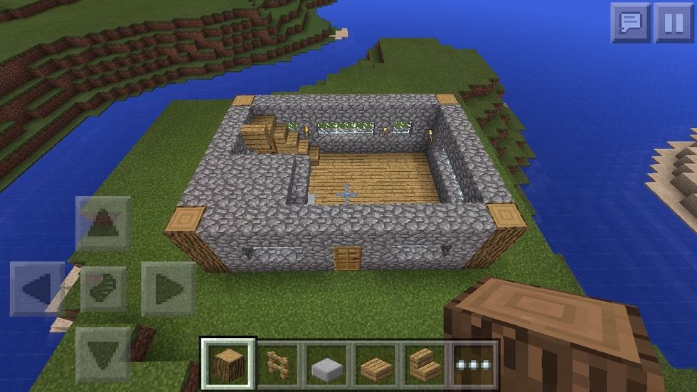 4th layer build the cobble stone up 1 make a cover for the crafting table and furnaces and build more stairs