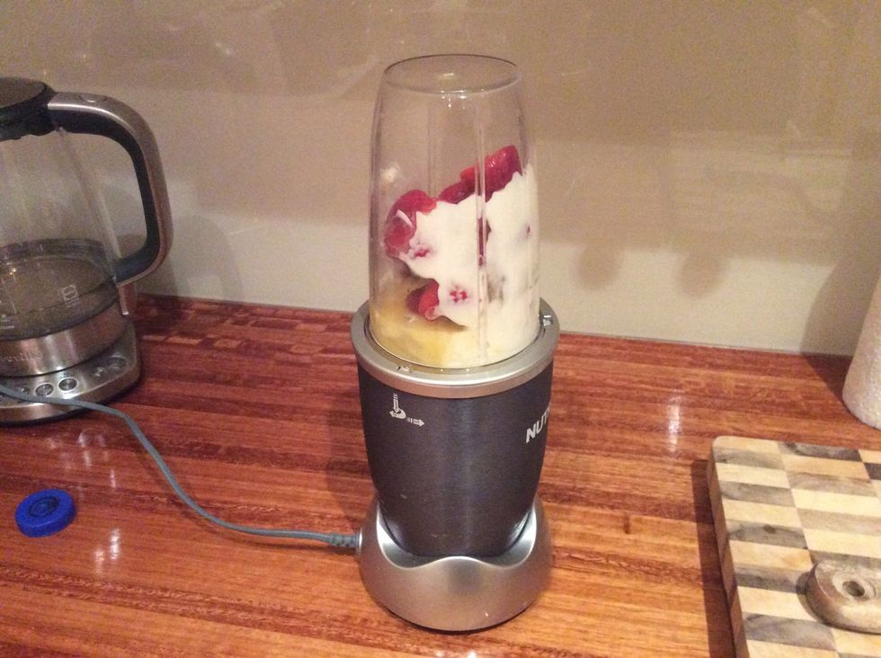 5. Blend your items together making sure you pause after five seconds then blend again repeat this until fully mixed you may need to stir in between mixes to make sure no strawberries or ice get stuck