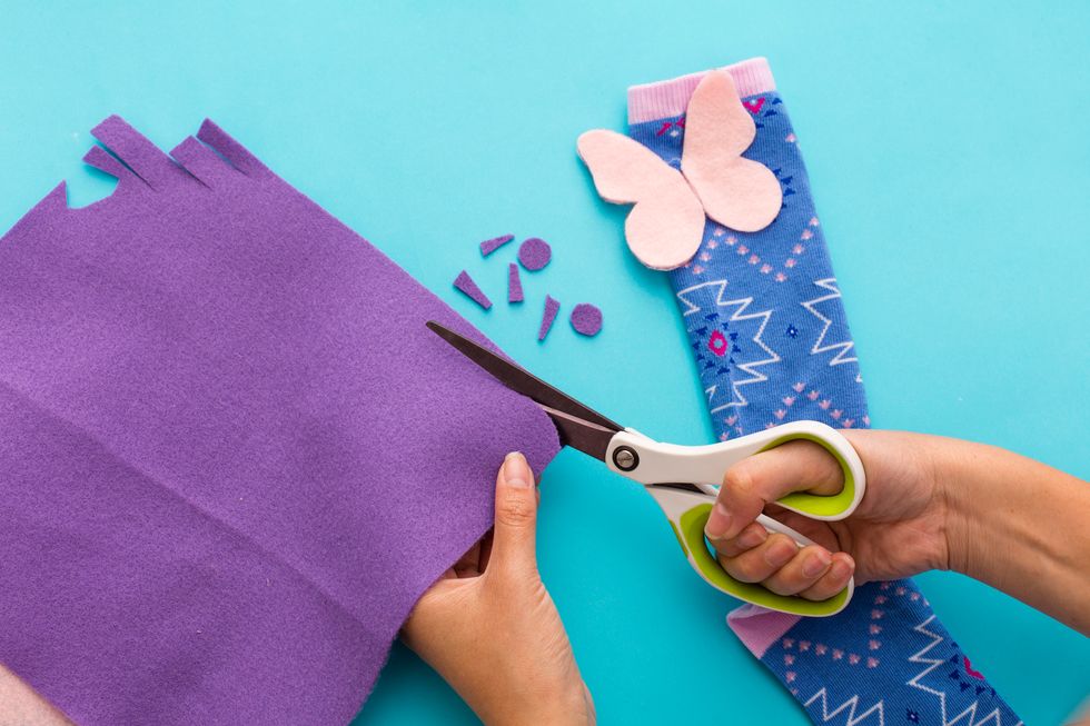 5. Cut out more shapes with a different colored felt.