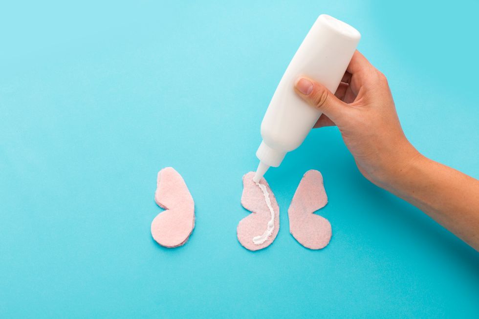 5. Glue two of your shapes together to make your wing thicker.