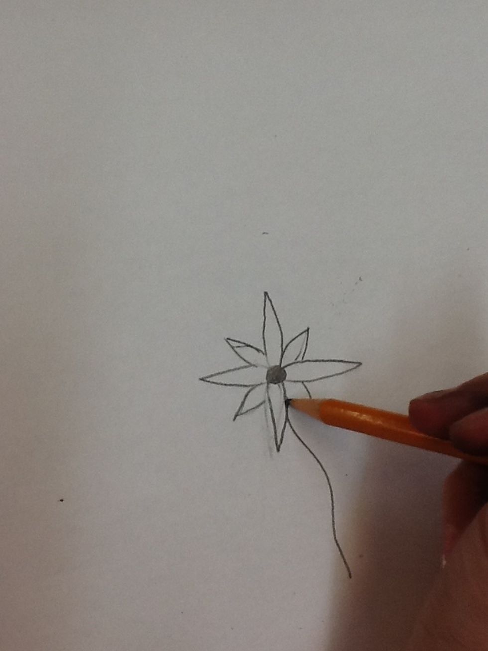 5) Then, you're going to draw a stem under your large petals that was in the middle .