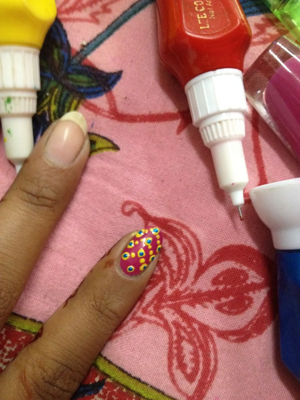 5.This one add a base and then draw dots making a v shape..jus dot them again to make them look prettier