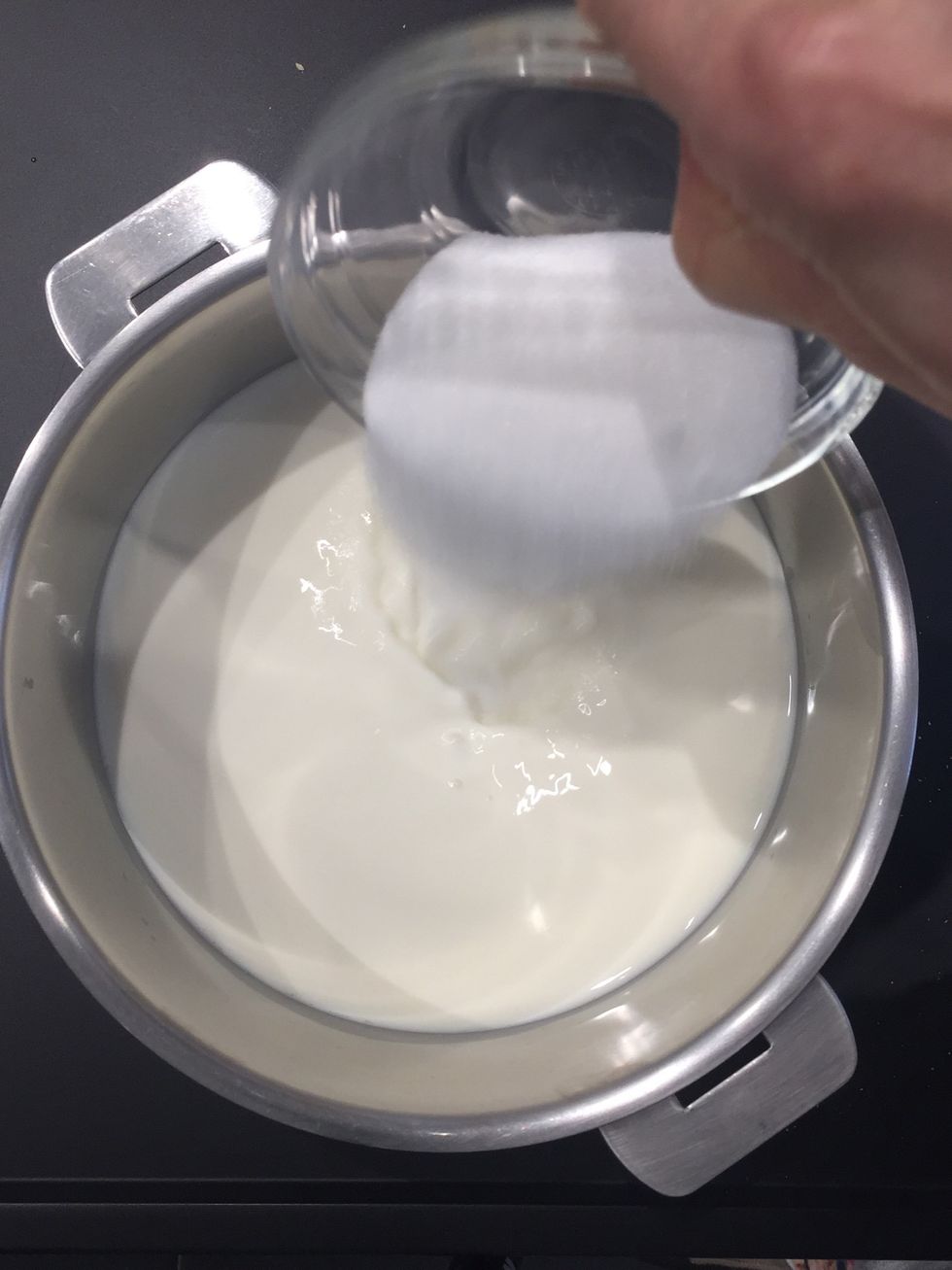 500 ml milk. Add 50g sugar. Heat until sugar has melted and the milk is simmering. Then\u25b6\ufe0f