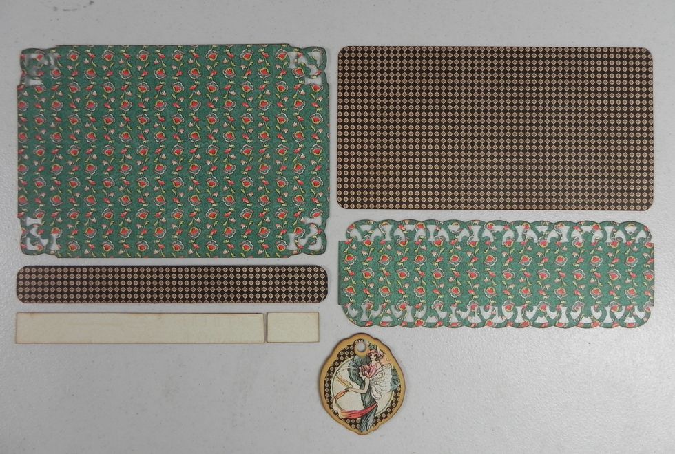 6 1/4 x 4 1/4" - all corners punched. 6 1/4 x 3 1/4" and 6 1/4 x 3/4" - 1/4" corner punch. 6 1/4 x 2 1/4" - edge punch. 6 1/4 x 5/8 is actually 6 x 6" cut where the chipboard piece will hide it.