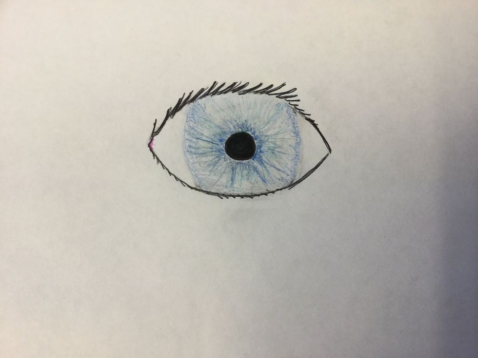 6. Add color starting darker at the pupil, and lighter as it spreads out