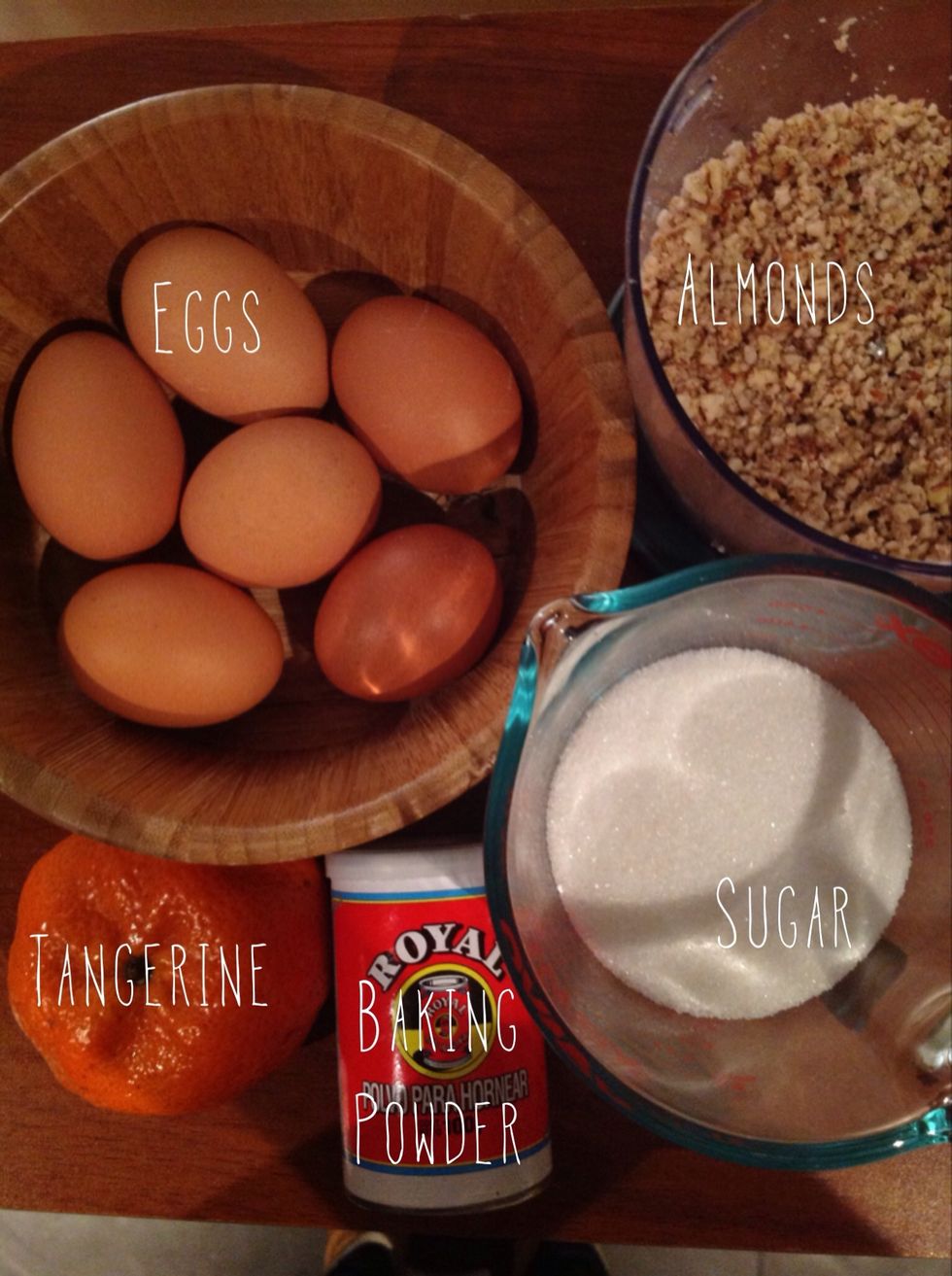 6 eggs, 2 tangerines, 225 grs of white sugar, 250 grs ground almonds, 1/2 teaspoon of baking powder