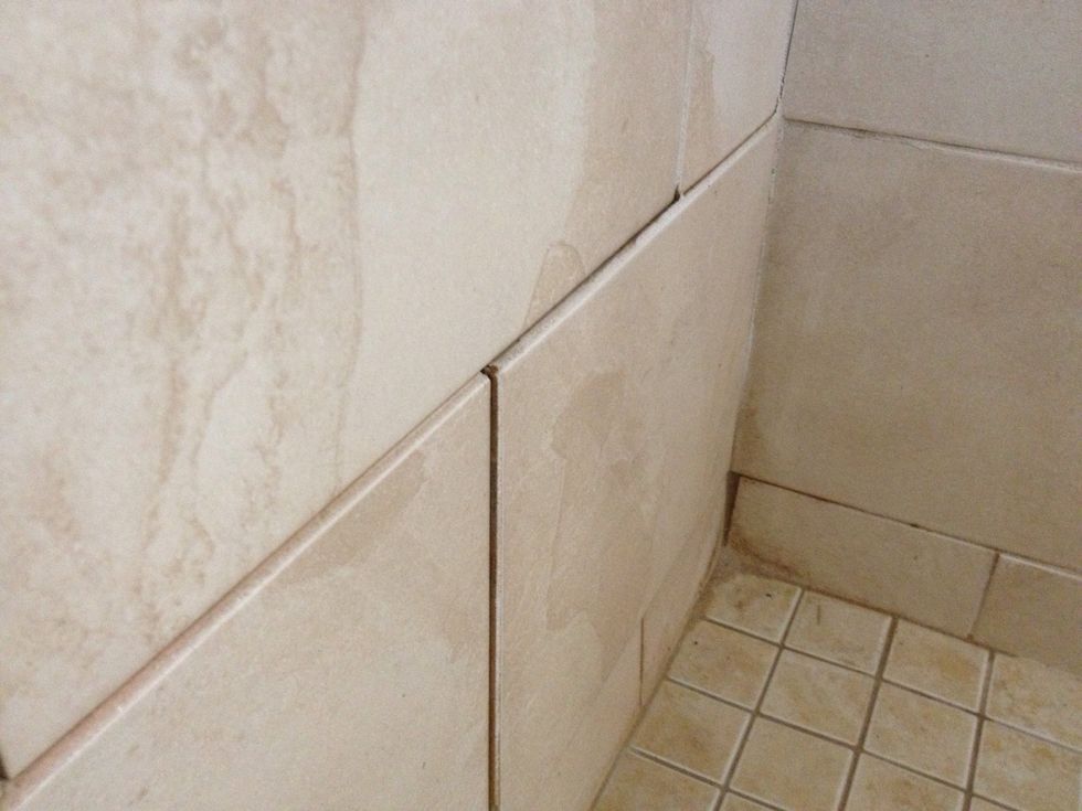 6 months after we hired someone from Craig's List to do the tile in our shower, one of the bottom tiles started coming loose