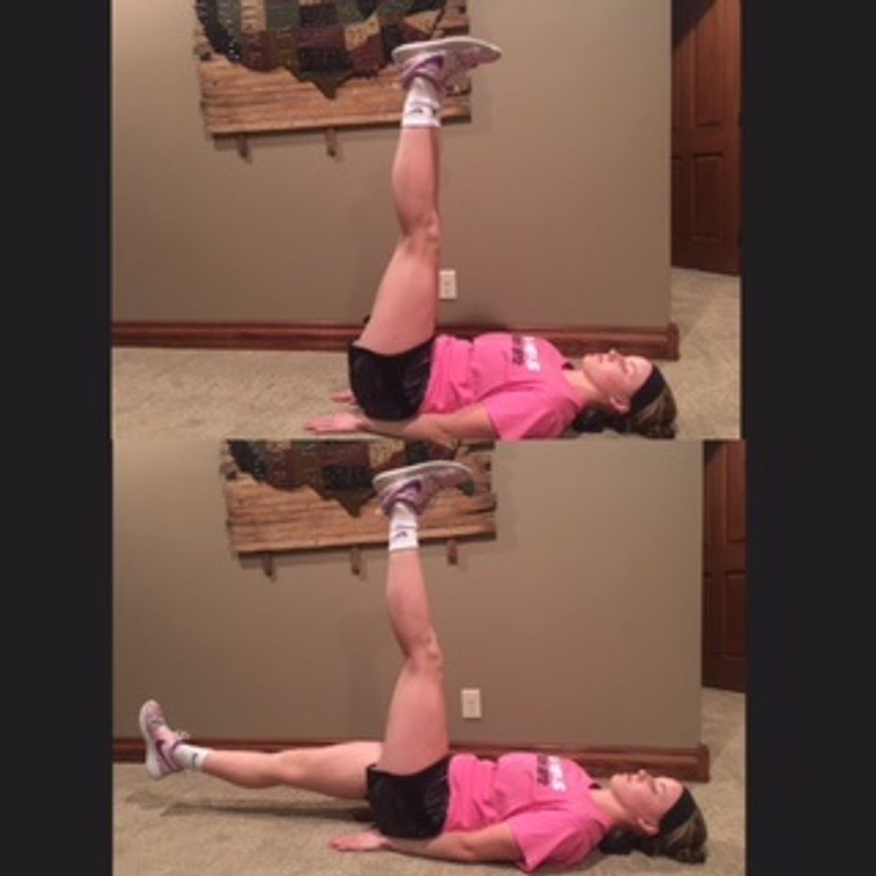 6.Scissor Kicks- Lie on the ground with legs extended upwards. Keeping one leg straight, lower the opposite towards the ground. While raising the leg back up, lower the opposite. Do 15 reps each side.