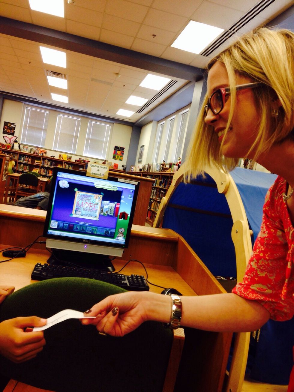 6. Show the librarian your paper and ask, "Can you please help me find this book?"