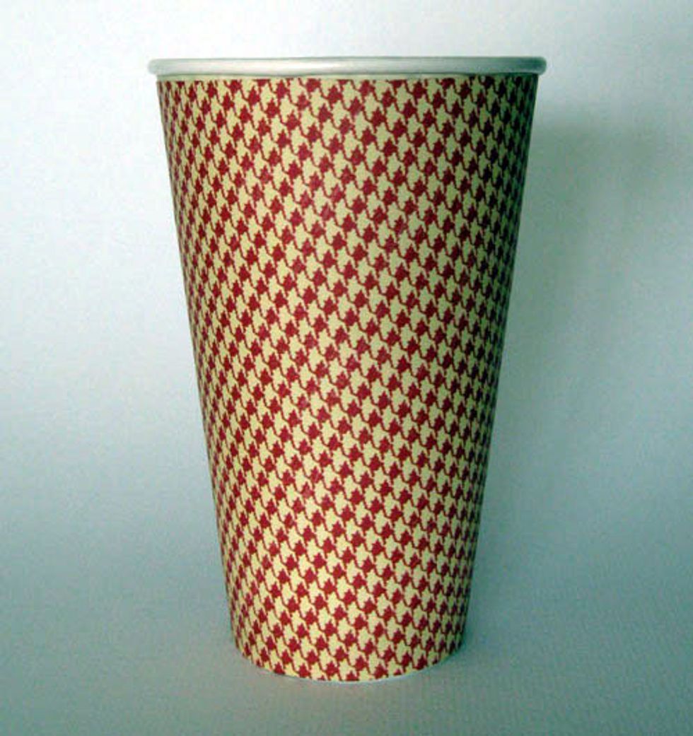 6.\tAdhere cup cover to an uncut coffee cup.