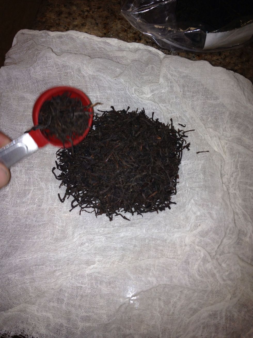 6 tbsp tea wrapped up to form super size tea bag using a fine weave cheesecloth.