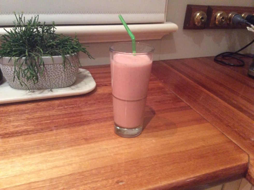 7. Blend until smooth. Serve in a chilled glass if you desire or pour into cups to share. Top your smoothie off with a straw and enjoy.