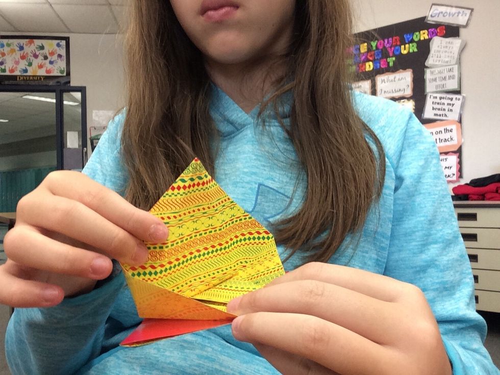 7. Flip open the very top layer