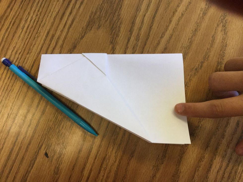 7. Fold in half backwards.