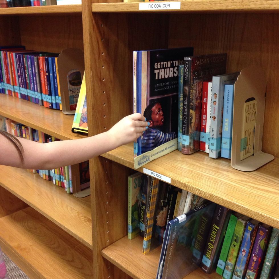 7. If you don't want the book, put it back on the shelf next to the shelf marker.