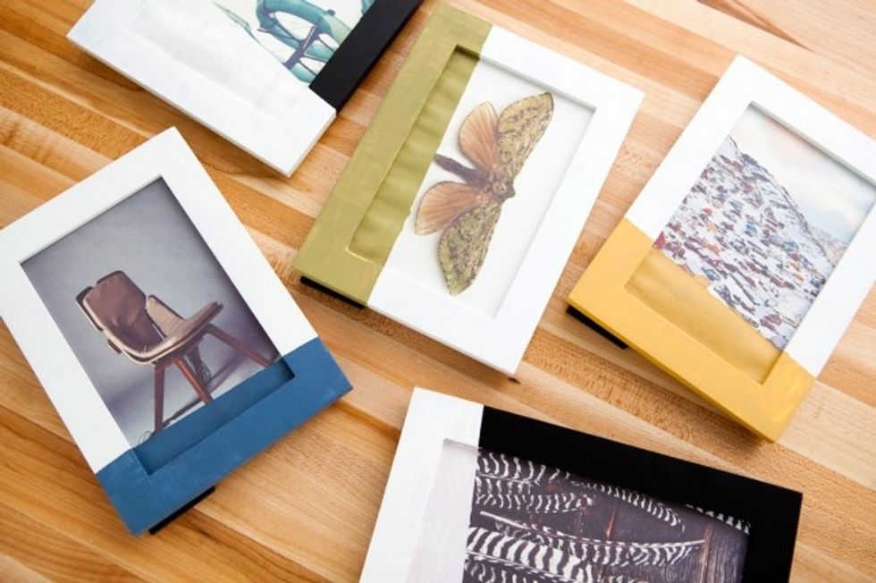 8. Framed Photos: Take a stroll down nostalgia lane by printing some of your fave photos of the two of you and framing them in these DIY paint-dipped picture frames. http://go.brit.co/2bmrry5